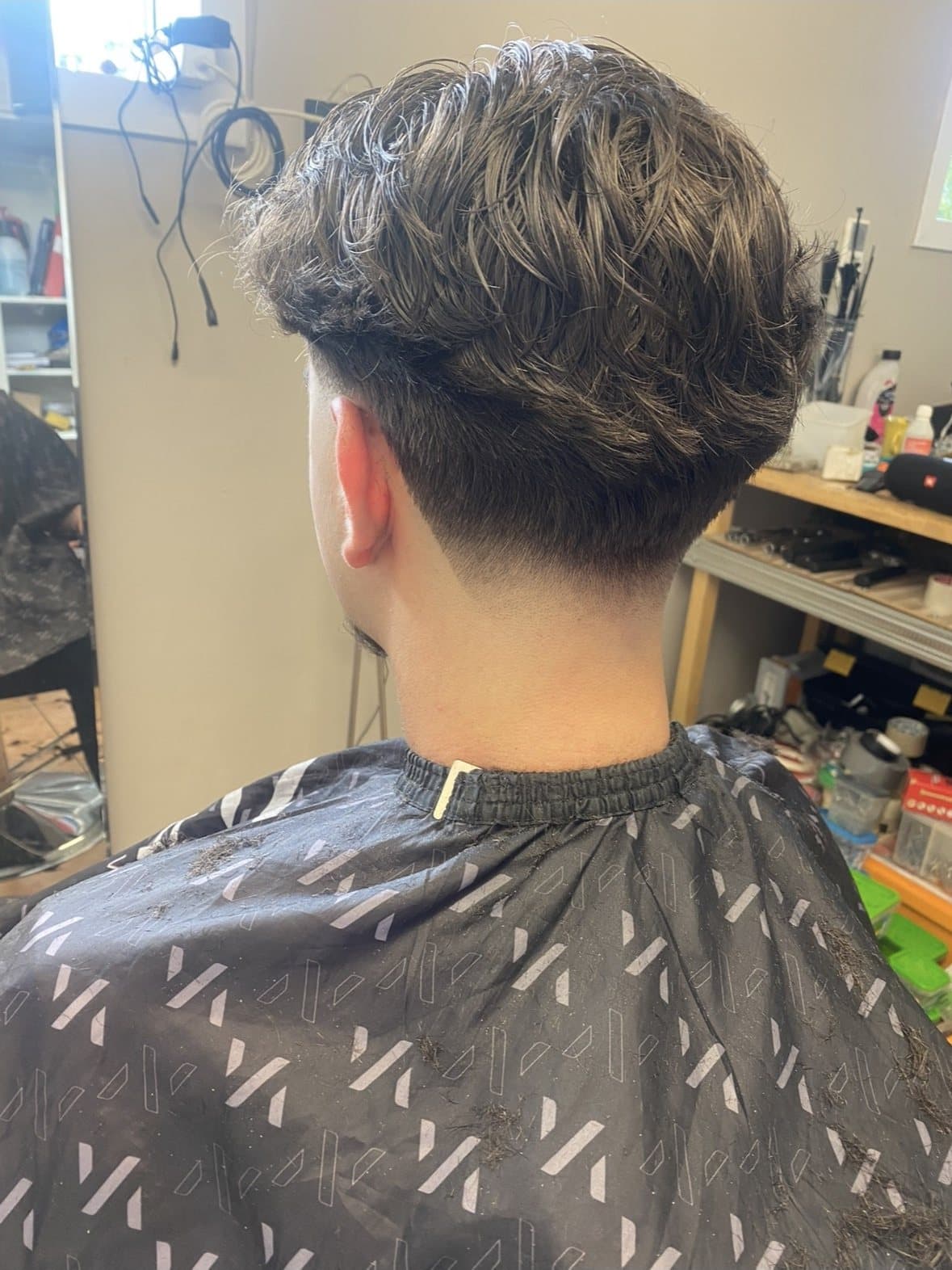 En taper fade bakifrån.